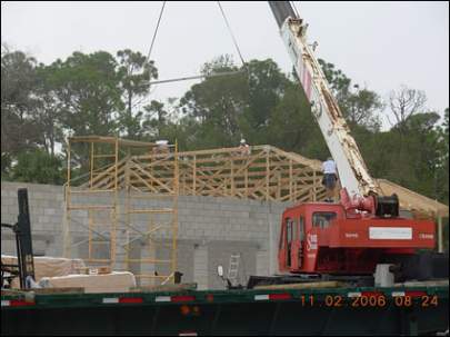 Chesnutt Commercial Plaza under construction, with roof frame